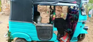 Bajaj RE 2003