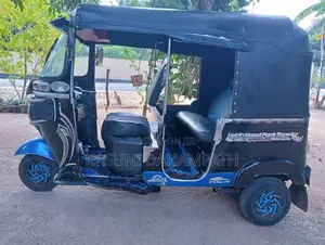 Bajaj RE 2013