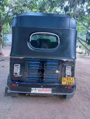 Bajaj RE 2013