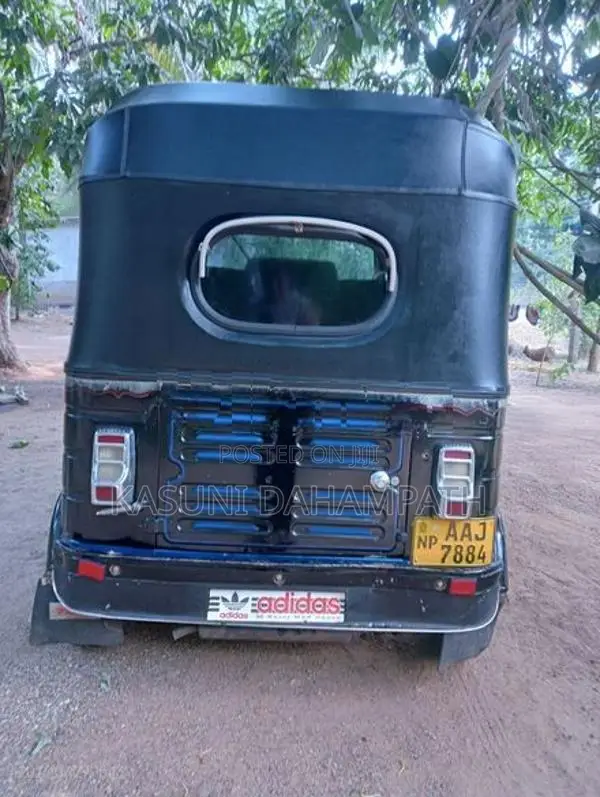Bajaj RE 2013