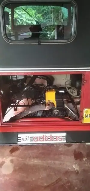 Bajaj RE 2013