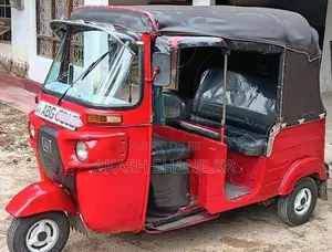 Bajaj RE Trim 2015