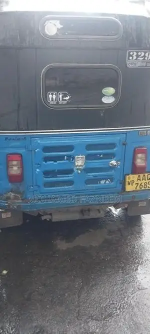 Bajaj RE 2014