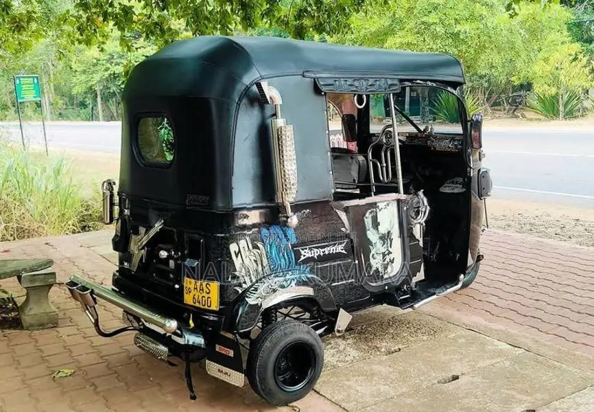 Bajaj RE 2014