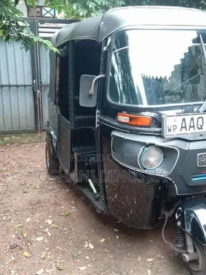 Bajaj RE 2014