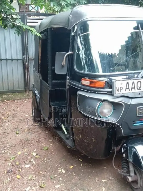 Bajaj RE 2014