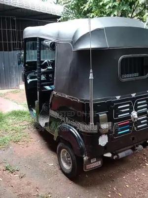 Bajaj RE 2014
