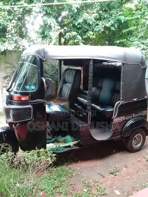 Bajaj RE 2014