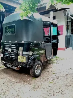 Bajaj RE 2014