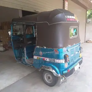 Bajaj RE 2013
