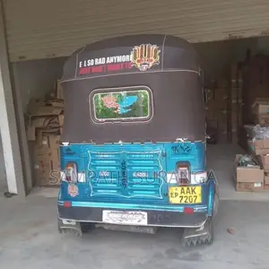 Bajaj RE 2013