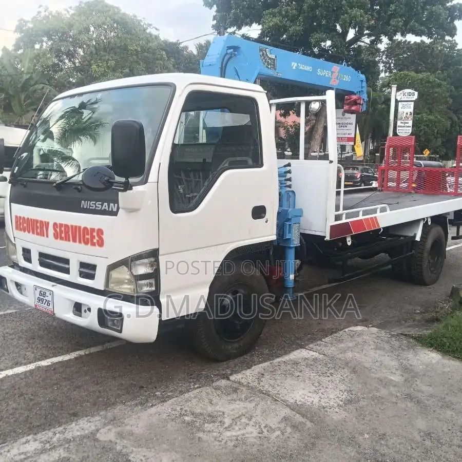 Nissan Boom Truck With Carrier 1994 Heavy-Duty (Used)