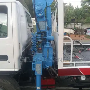 Nissan Boom Truck With Carrier 1994 Heavy-Duty (Used)