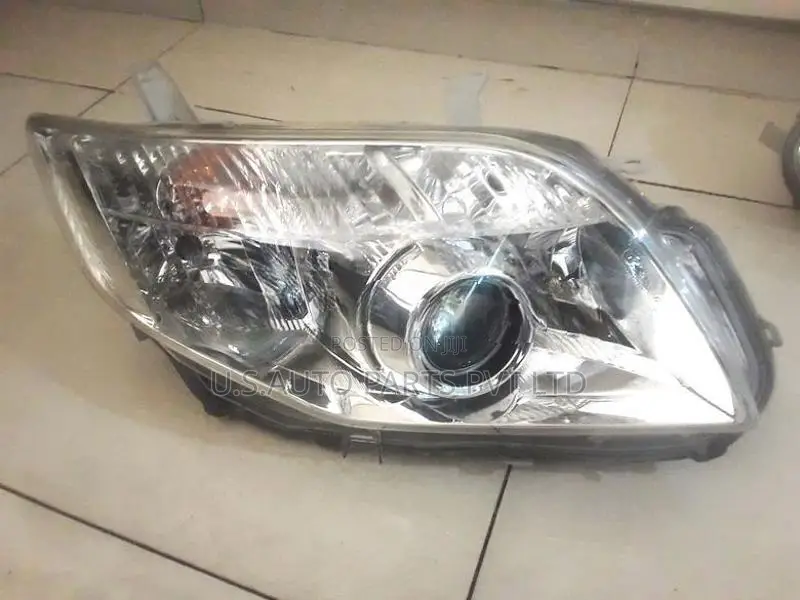 Toyota Axio NZE141 Scoop Head Lamp RH