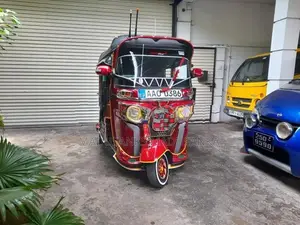 Bajaj RE 2014