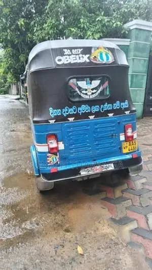 Bajaj RE 2014