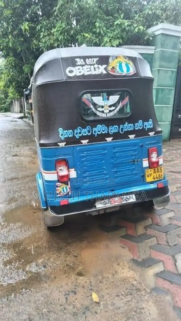 Bajaj RE 2014