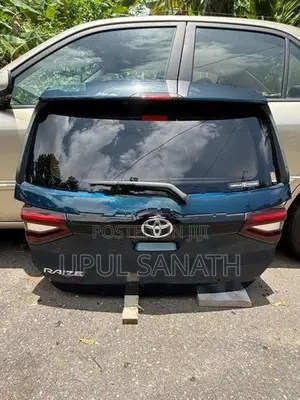 Toyota Reize Tail Door