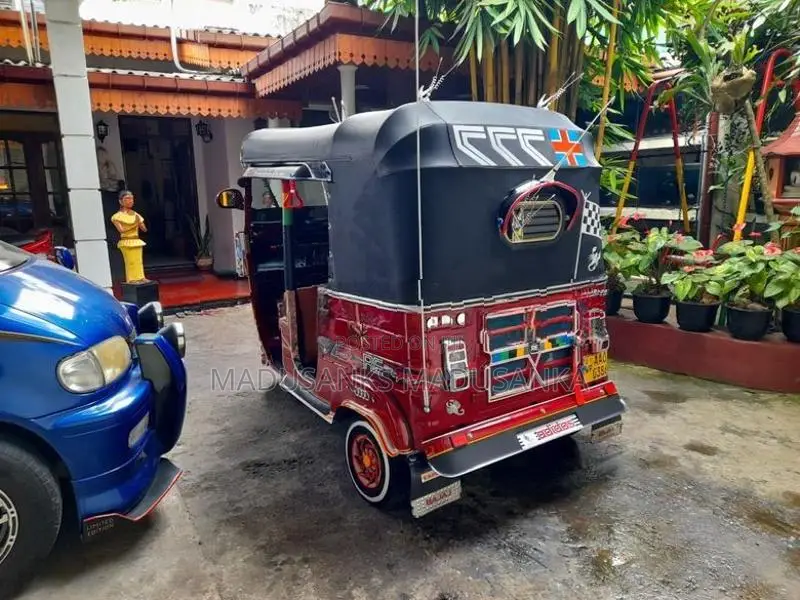 Bajaj RE 2014