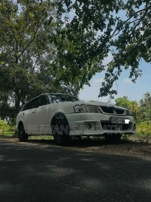 Nissan Wingroad Y11 2003
