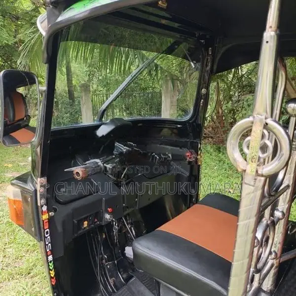 Bajaj RE 2013