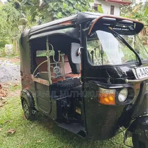 Bajaj RE 2013