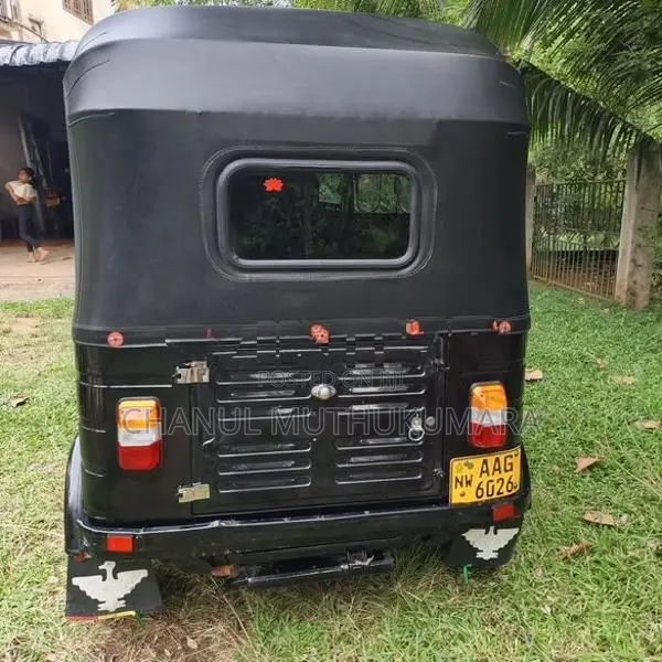 Bajaj RE 2013