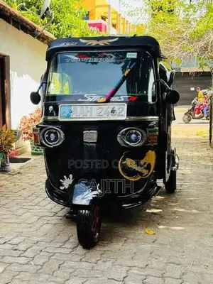 Bajaj RE 2013