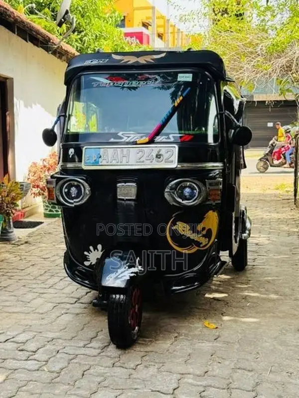 Bajaj RE 2013