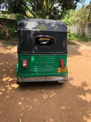 Bajaj RE 2014