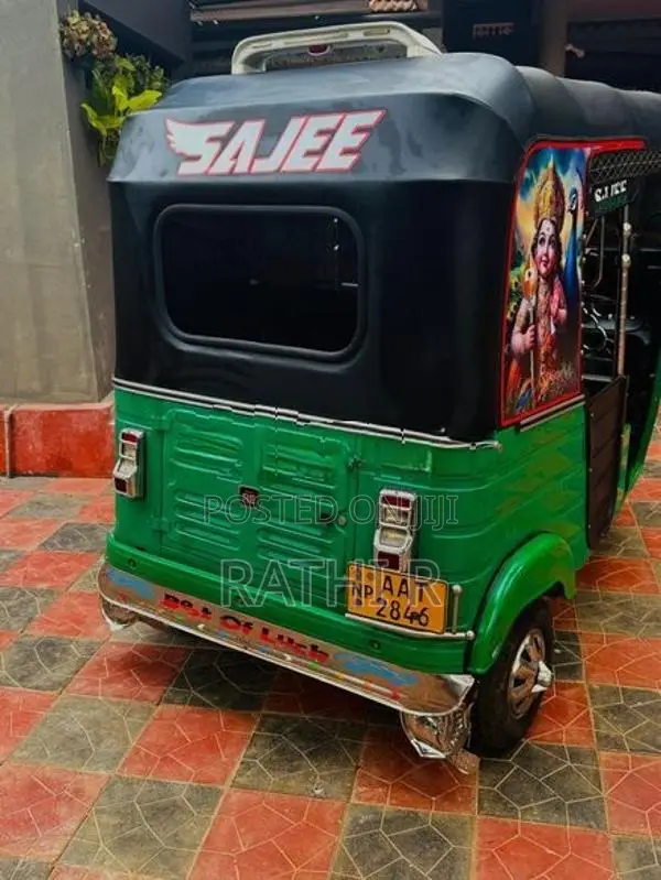 Bajaj RE 2014
