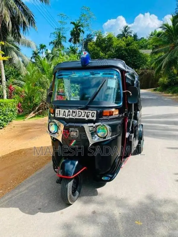 Bajaj RE 2014