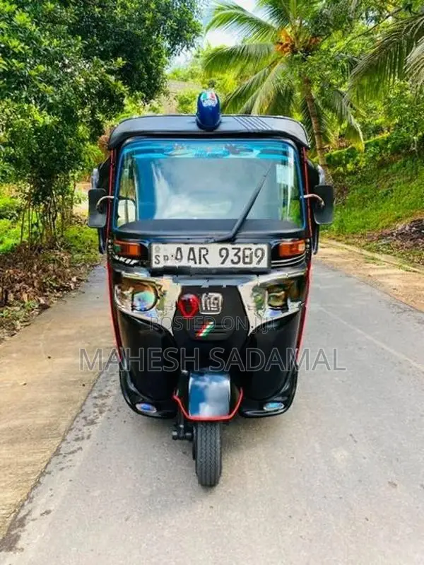 Bajaj RE 2014