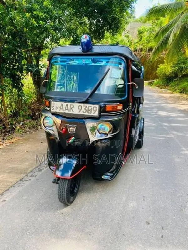 Bajaj RE 2014