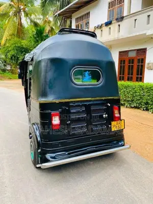 Bajaj RE 2014