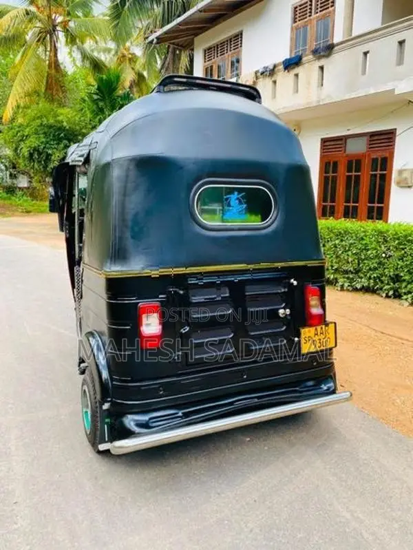 Bajaj RE 2014