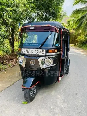 Bajaj RE 2014