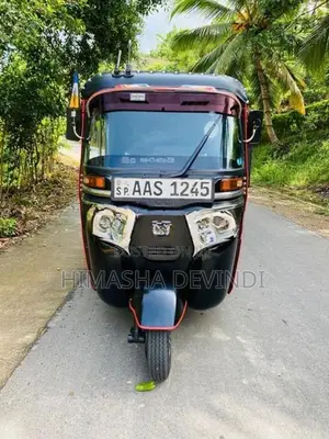 Bajaj RE 2014
