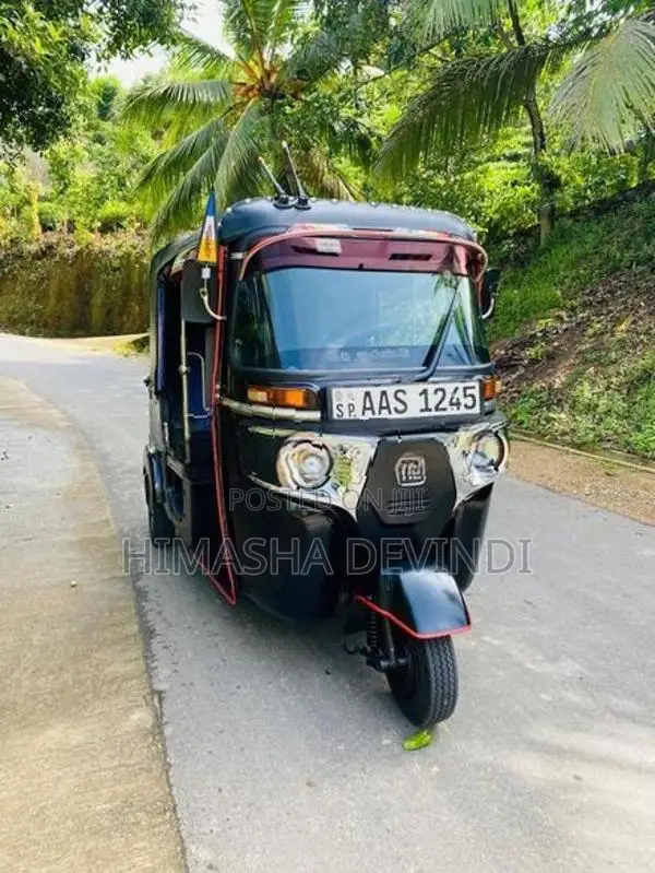 Bajaj RE 2014