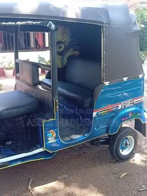 Bajaj RE 2002