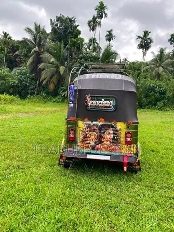Bajaj RE 2013