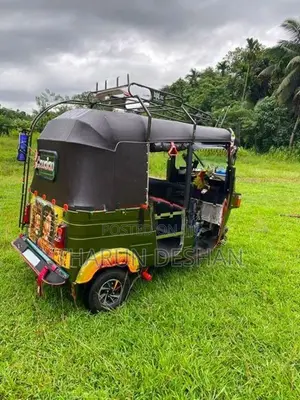 Bajaj RE 2013