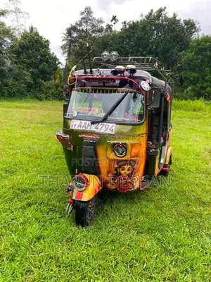Bajaj RE 2013