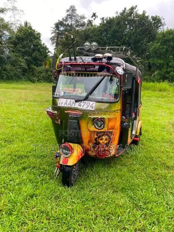 Bajaj RE 2013