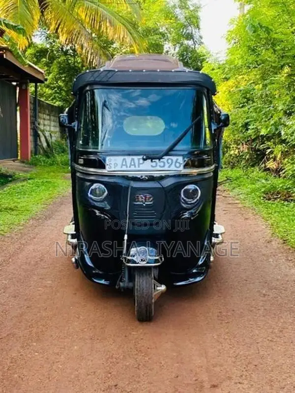 Bajaj RE 2014
