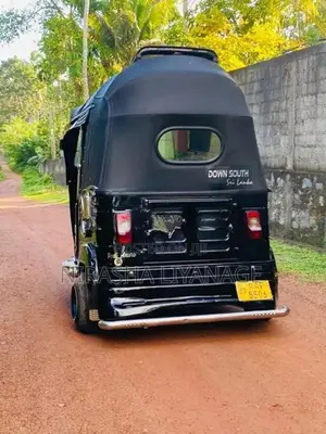 Bajaj RE 2014