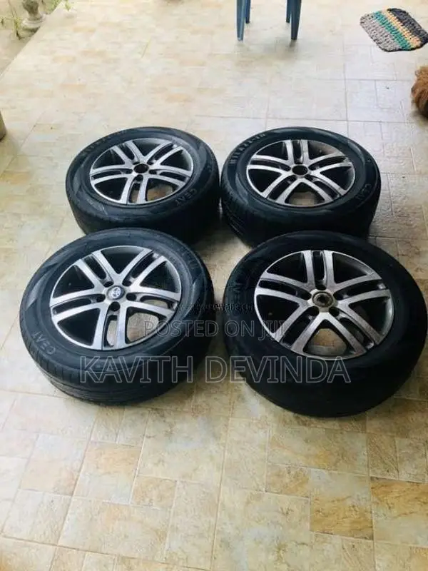 Toyota original 15 inch alloy wheel with tyres for Car