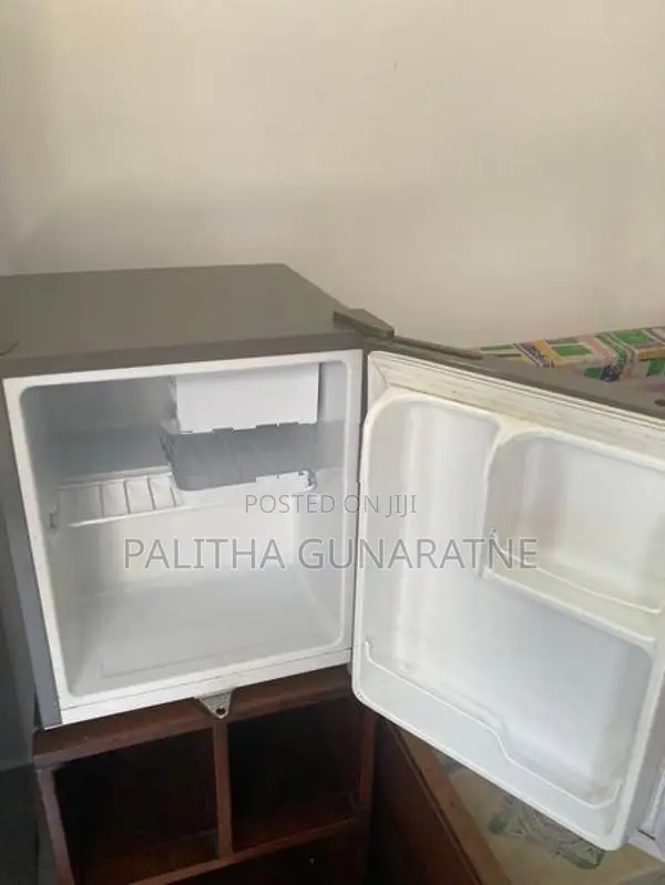 LG side by Refrigerator with Mini fridge