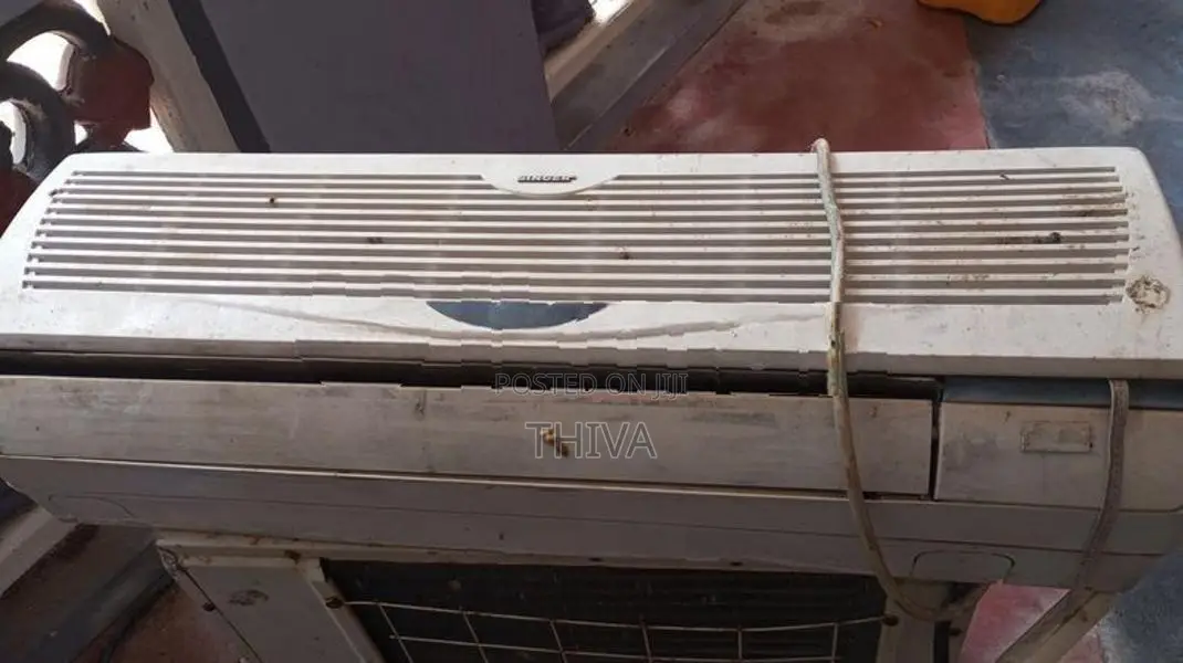 Singer Used Non- Inverter AC