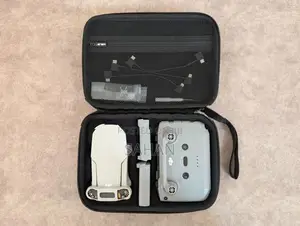 DJI Mini 4K Drone with Hard Case Spare Battery